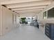 Covered outdoor area with an open view of the pool and backyard at 2416 Emory Ave, Bradenton, FL 34207