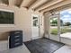 Enclosed patio featuring modern flooring and a view of the outdoors at 2416 Emory Ave, Bradenton, FL 34207