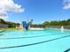 A large community pool with a water slide, offering recreational fun at 2416 Emory Ave, Bradenton, FL 34207
