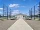 View of a baseball field building and bleachers, ready for fans and players at 245 Cape Harbour Loop # 103, Bradenton, FL 34212