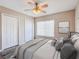 Relaxing bedroom with neutral colors, comfortable bedding, and ample closet space at 245 Cape Harbour Loop # 103, Bradenton, FL 34212
