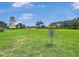 Community disc golf course with lush green grass, blue skies, and a lighthouse at 245 Cape Harbour Loop # 103, Bradenton, FL 34212