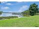 Scenic view of the lake with a wooden pier, perfect for relaxation and enjoying nature at 245 Cape Harbour Loop # 103, Bradenton, FL 34212