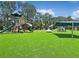 A colorful playground with slides and ladders and a covered picnic area for community gatherings at 245 Cape Harbour Loop # 103, Bradenton, FL 34212