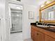 Well-maintained bathroom with a walk-in shower and vanity at 2748 Orchid Oaks Dr # 202, Sarasota, FL 34239