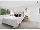 Cozy bedroom with a comfortable bed and elegant decor at 2748 Orchid Oaks Dr # 202, Sarasota, FL 34239