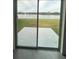 View from inside the home of the back patio and the water view behind the home at 2824 Rock Sound St, Bradenton, FL 34208