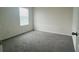 Neutral bedroom featuring carpeted flooring and a window for natural light at 2824 Rock Sound St, Bradenton, FL 34208