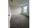 Carpeted bedroom featuring a window for natural light at 2824 Rock Sound St, Bradenton, FL 34208