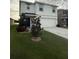 This lovely home boasts a manicured lawn, charming landscaping, and an attached two-car garage at 2824 Rock Sound St, Bradenton, FL 34208