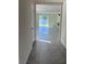 Hallway leads to the living room and has tile flooring at 2824 Rock Sound St, Bradenton, FL 34208