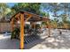 Backyard gazebo with comfortable seating, perfect for outdoor entertaining and relaxation at 3011 Bougainvillea St, Sarasota, FL 34239