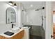 Modern bathroom featuring sleek fixtures, a vessel sink, and a walk-in shower with glass enclosure at 3011 Bougainvillea St, Sarasota, FL 34239