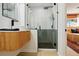Sleek bathroom with modern fixtures, vessel sink, and frameless glass shower enclosure at 3011 Bougainvillea St, Sarasota, FL 34239