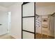 View of closet with sliding door and custom shelving for optimal storage and organization at 3011 Bougainvillea St, Sarasota, FL 34239