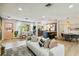Open living area with modern decor, and seamless flow to the kitchen and dining, perfect for entertaining at 3011 Bougainvillea St, Sarasota, FL 34239