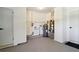 Utility room with water heater, HVAC, and ample storage space for organization at 3011 Bougainvillea St, Sarasota, FL 34239