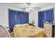 Inviting bedroom with a comfortable bed, soft lighting, and classic decor, creating a relaxing and peaceful retreat at 3511 39Th E St, Palmetto, FL 34221