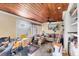 Cozy living room with hardwood ceiling, comfortable seating, and natural light, creating a relaxing and inviting atmosphere at 3511 39Th E St, Palmetto, FL 34221