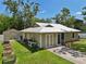 Charming home with a well-manicured yard and a storage shed in the back at 4023 Hina Dr, Sarasota, FL 34241