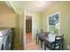 Cozy kitchenette with a view of the yard, featuring a table for dining and appliances at 4023 Hina Dr, Sarasota, FL 34241