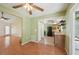 Open-concept living space connecting kitchen, dining, and sitting areas with lots of natural light at 4023 Hina Dr, Sarasota, FL 34241