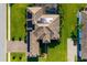 Drone eye view of home with solar panels and screened in pool at 408 166Th E St, Bradenton, FL 34212