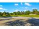 Outdoor basketball court provides a recreational space for sports and community activities at 408 166Th E St, Bradenton, FL 34212