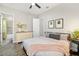Cozy bedroom featuring a comfortable bed and ensuite bathroom with a shower at 408 166Th E St, Bradenton, FL 34212