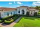 Beautiful single-story home with a tile roof, manicured landscaping, and inviting curb appeal at 408 166Th E St, Bradenton, FL 34212