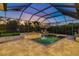 Inviting screened-in pool and spa area perfect for relaxing and entertaining outdoors at 408 166Th E St, Bradenton, FL 34212