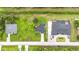 Aerial view of homesites showing spacious lots and neighborhood street at 4148 Lobelia St, North Port, FL 34286