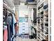 Walk-in closet with custom shelving and organization at 4148 Lobelia St, North Port, FL 34286