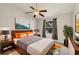 Cozy bedroom featuring a comfortable bed, stylish decor, and a calming ambiance with natural lighting at 4210 Vicenza Dr # D25, Venice, FL 34293