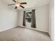 Bedroom featuring neutral paint, carpet, and a bright window with coverings at 4210 Vicenza Dr # D25, Venice, FL 34293
