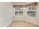 Breakfast Nook with tile flooring and natural light streaming through the windows at 4210 Vicenza Dr # D25, Venice, FL 34293