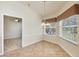 Breakfast Nook with tile flooring and natural light streaming through the windows at 4210 Vicenza Dr # D25, Venice, FL 34293