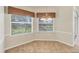 Breakfast Nook with tile flooring and natural light streaming through the windows at 4210 Vicenza Dr # D25, Venice, FL 34293
