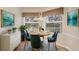 Breakfast Nook with table, chairs, and view from two bright windows at 4210 Vicenza Dr # D25, Venice, FL 34293