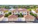 Charming condos with attached garages are enhanced by lush landscaping and a serene lake view at 4210 Vicenza Dr # D25, Venice, FL 34293