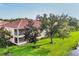 Well-maintained condos feature screened lanais overlooking a well-manicured lawn and lush trees at 4210 Vicenza Dr # D25, Venice, FL 34293