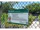 Informative sign about Bee Ridge Community Garden, promoting community, nutrition, and recreation in Sarasota County at 4214 Groveland Ave, Sarasota, FL 34231
