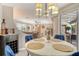 Inviting dining area connected to the living room and screened-in back porch at 4214 Groveland Ave, Sarasota, FL 34231