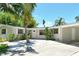 Charming single-story home with well-maintained landscaping and a driveway at 4214 Groveland Ave, Sarasota, FL 34231