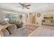 Open concept living room featuring tv set, and entryway at 4214 Groveland Ave, Sarasota, FL 34231