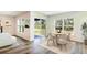 Cozy dining area with modern chairs, a round table, and abundant natural light at 4336 112Th E St, Palmetto, FL 34221