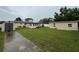 Large backyard featuring a shed and a well-maintained lawn perfect for outdoor activities at 4337 15Th N Ave, St Petersburg, FL 33713