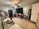 Large sewing and craft room with a ceiling fan and lots of natural light coming through the windows at 4337 15Th N Ave, St Petersburg, FL 33713