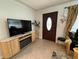 Inviting entryway with tiled floor, decorative console table and stylish furniture accents at 4337 15Th N Ave, St Petersburg, FL 33713