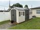 Durable backyard storage shed with double doors, windows, and ample space for tools and garden supplies at 4337 15Th N Ave, St Petersburg, FL 33713